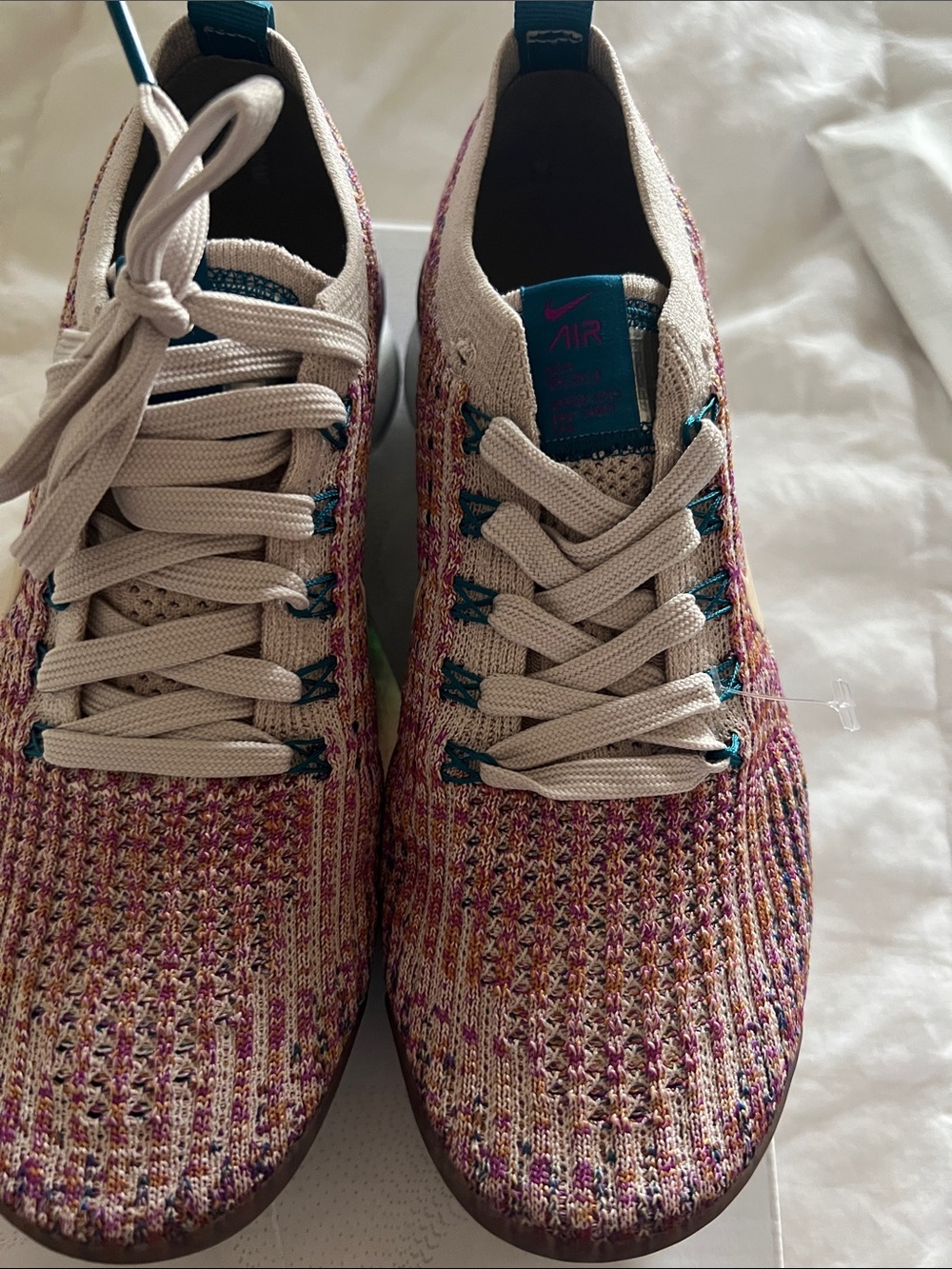 Nike Women's Flyknit Sneaker — Cream with Pink & Teal Accents